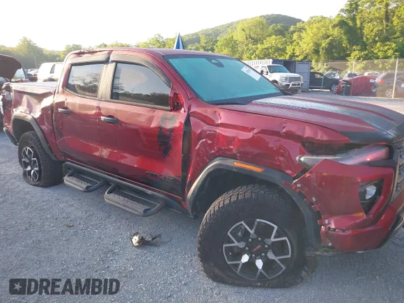 ✅ 2023 GMC Canyon 4WD AT4X • VIN: 1GTP6EEK9P1153310 • Lot: 42558790. Wystawiony na IAAI z przebiegiem 11 715 mil. Bezpłatny archiwum sprzedaży aukcyjnych z USA i szczegółowy raport historii pojazdu na DreamBid. Zdjęcie 1.