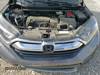 ✅ 2018 Honda CR-V LX • VIN: 5J6RW6H30JL000579 • Lot: 93430485. Wystawiony na Copart z przebiegiem 91 942 mil. Bezpłatny archiwum sprzedaży aukcyjnych z USA i szczegółowy raport historii pojazdu na DreamBid. Zdjęcie 14.