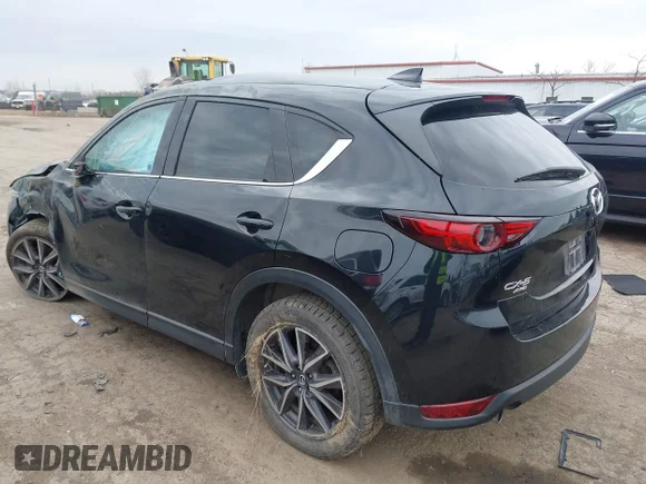 ✅ 2018 Mazda CX-5 Grand Touring • VIN: JM3KFBDM0J0432256 • Lot: 44730431. Listed on IAAI with 111,820 mi. Free auction sales archive from the USA and detailed vehicle history report at DreamBid. Image 3.