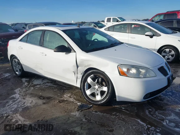 ✅ 2009 Pontiac G6 1SA • VIN: 1G2ZG57B394187803 • Lot: 41100404. Wystawiony na IAAI z przebiegiem 242 388 mil. Bezpłatny archiwum sprzedaży aukcyjnych z USA i szczegółowy raport historii pojazdu na DreamBid. Zdjęcie 1.