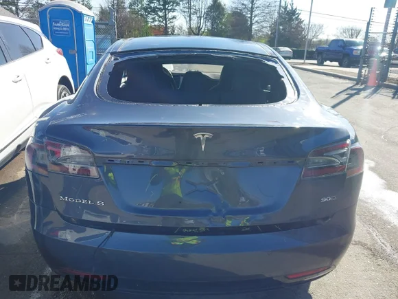 ✅ 2016 Tesla Model S 90D • VIN: 5YJSA1E21GF156453 • Lot: 41822459. Listed on IAAI with 41,144 mi. Free auction sales archive from the USA and detailed vehicle history report at DreamBid. Image 6.