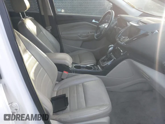 ✅ 2014 Ford Escape Titanium • VIN: 1FMCU9J91EUB11171 • Lot: 44242835. Listed on IAAI with 221,015 mi. Free auction sales archive from the USA and detailed vehicle history report at DreamBid. Image 5.