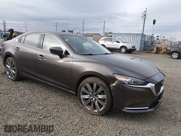 ✅ 2018 Mazda 6 Signature • VIN: JM1GL1XY5J1306212 • Лот: 44729770. Опубліковано раніше на IAAI з пробігом 77 143 миль. Безкоштовний доступ до архіву аукціонних продажів зі США та докладний звіт про історію автомобіля на DreamBid. Зображення 1.