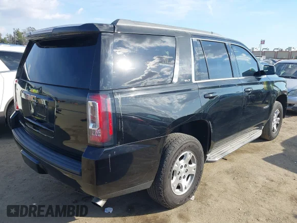 ✅ 2015 GMC Yukon SLT • VIN: 1GKS1BKC9FR501812 • Lot: 41546517. Listed on IAAI with 159,114 mi. Free auction sales archive from the USA and detailed vehicle history report at DreamBid. Image 4.