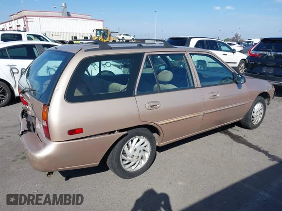 ✅ 1999 Ford Escort SE • VIN: 3FAFP15P6XR102047 • Lot: 41686181. Wystawiony na IAAI z przebiegiem 61 350 mil. Bezpłatny archiwum sprzedaży aukcyjnych z USA i szczegółowy raport historii pojazdu na DreamBid. Zdjęcie 4.