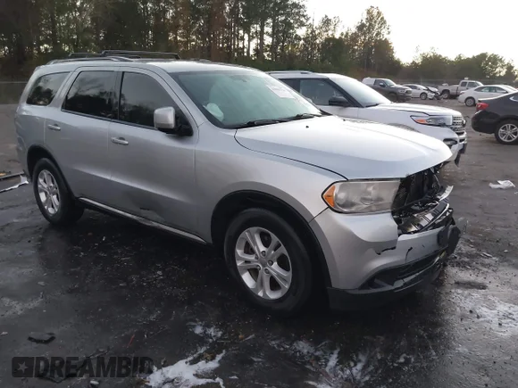 ✅ 2012 Dodge Durango Crew • VIN: 1C4RDHDG6CC285629 • Lot: 43905724. Listed on IAAI with 300,390 mi. Free auction sales archive from the USA and detailed vehicle history report at DreamBid. Image 1.