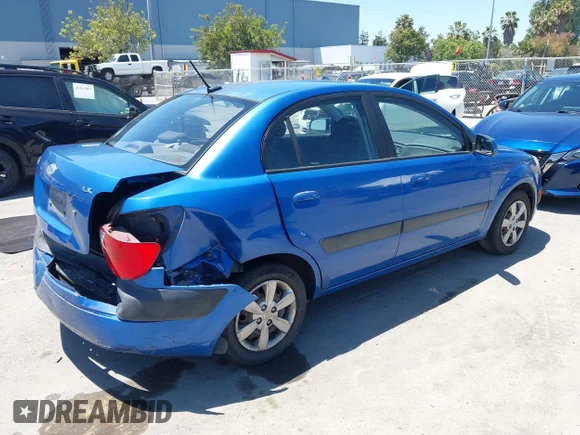 ✅ 2009 Kia Rio LX • VIN: KNADE223796486366 • Лот: 45242358. Опубликован ранее на IAAI с пробегом 215 716 миль. Бесплатный доступ к архиву аукционных продаж из США и подробный отчёт об истории автомобиля на DreamBid. Изображение 4.