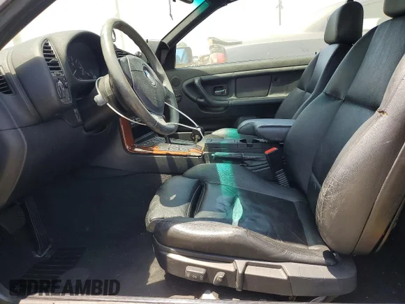 ✅ 1999 BMW 3 Series 328i • VIN: WBABK8334XEY92979 • Lot: 55748376. Listed on Copart with 176,631 mi. Free auction sales archive from the USA and detailed vehicle history report at DreamBid. Image 7.
