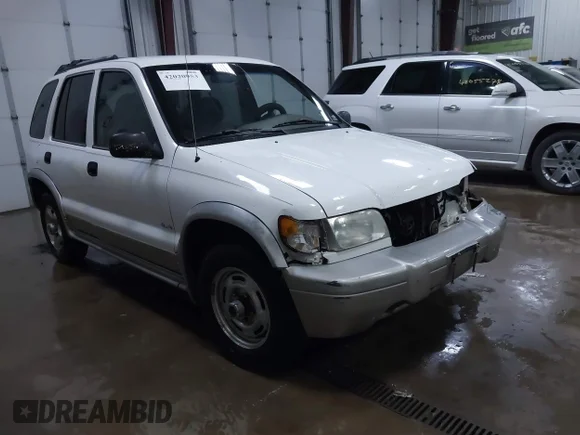 ✅ 2000 Kia Sportage • VIN: KNDJA7231Y5656286 • Лот: 42020953. Опубліковано раніше на IAAI з пробігом 158 777 миль. Безкоштовний доступ до архіву аукціонних продажів зі США та докладний звіт про історію автомобіля на DreamBid. Зображення 1.