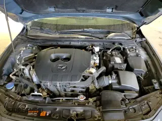 ✅ 2023 Mazda 3 S Carbon Edition • VIN: 3MZBPBCM5PM360027 • Лот: 70913525. Опубликован ранее на Copart с пробегом 43 307 миль. Бесплатный доступ к архиву аукционных продаж из США и подробный отчёт об истории автомобиля на DreamBid. Изображение 15.