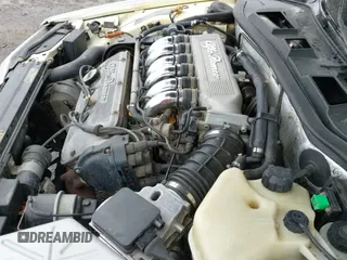 ✅ 1991 Alfa Romeo 164 • VIN: ZAREA33L2M6201532 • Lot: 42149538. Listed on IAAI with 120,470 mi. Free auction sales archive from the USA and detailed vehicle history report at DreamBid. Image 12.