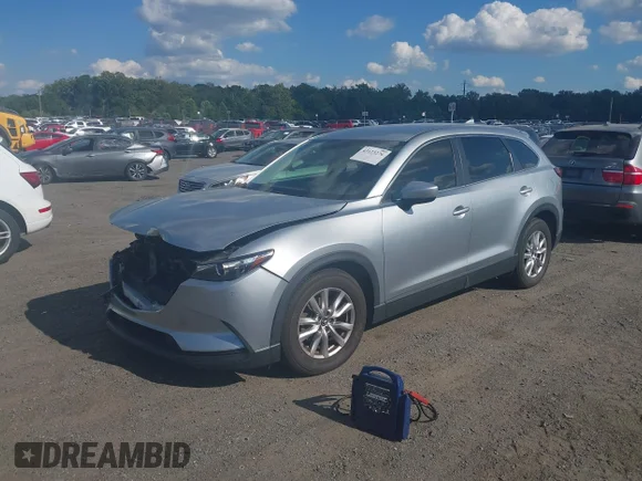 ✅ 2016 Mazda CX-9 Sport • VIN: JM3TCBBYXG0109246 • Lot: 43123276. Wystawiony na IAAI z przebiegiem 116 357 mil. Bezpłatny archiwum sprzedaży aukcyjnych z USA i szczegółowy raport historii pojazdu na DreamBid. Zdjęcie 2.
