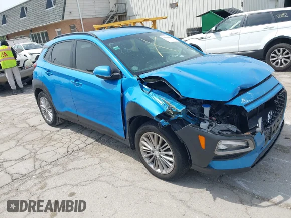 ✅ 2021 Hyundai Kona SEL • VIN: KM8K22AA5MU637465 • Lot: 45186698. Wystawiony na IAAI z przebiegiem 87 540 mil. Bezpłatny archiwum sprzedaży aukcyjnych z USA i szczegółowy raport historii pojazdu na DreamBid. Zdjęcie 1.