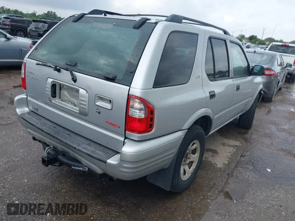 ✅ 2001 Isuzu Rodeo S • VIN: 4S2DM58WX14352481 • Lot: 42152621. Wystawiony na IAAI z przebiegiem 162 696 mil. Bezpłatny archiwum sprzedaży aukcyjnych z USA i szczegółowy raport historii pojazdu na DreamBid. Zdjęcie 4.