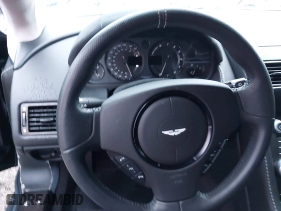 ✅ 2015 Aston Martin Vantage • VIN: SCFEBBAL2FGC18949 • Lot: 40503808. Wystawiony na IAAI z przebiegiem Nie podano. Bezpłatny archiwum sprzedaży aukcyjnych z USA i szczegółowy raport historii pojazdu na DreamBid. Zdjęcie 7.