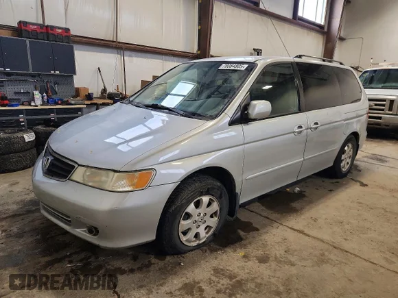 ✅ 2003 Honda Odyssey EX-L • VIN: 2HKRL18083H004460 • Lot: 78084805. Listed on Copart with 255,123 mi. Free auction sales archive from the USA and detailed vehicle history report at DreamBid. Image 1.