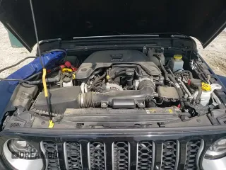 ✅ 2021 Jeep Gladiator High Altitude • VIN: 1C6HJTFG9ML585145 • Lot: 64464915. Listed on Copart with 91,607 mi. Free auction sales archive from the USA and detailed vehicle history report at DreamBid. Image 13.