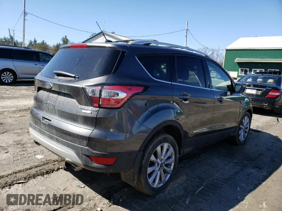 ✅ 2017 Ford Escape Titanium • VIN: 1FMCU9J96HUD63633 • Лот: 45450803. Опубликован ранее на Copart с пробегом 59 871 миль. Бесплатный доступ к архиву аукционных продаж из США и подробный отчёт об истории автомобиля на DreamBid. Изображение 3.