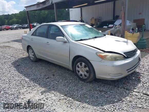 ✅ 2002 Toyota Camry LE • VIN: 4T1BE32K32U076989 • Lot: 42535073. Wystawiony na IAAI z przebiegiem 249 769 mil. Bezpłatny archiwum sprzedaży aukcyjnych z USA i szczegółowy raport historii pojazdu na DreamBid. Zdjęcie 1.