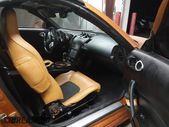 ✅ 2005 Nissan 350Z Grand Touring • VIN: JN1AZ36A25M755729 • Lot: 44643397. Wystawiony na IAAI z przebiegiem 131 622 mil. Bezpłatny archiwum sprzedaży aukcyjnych z USA i szczegółowy raport historii pojazdu na DreamBid. Zdjęcie 5.