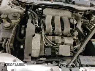 ✅ 1999 Ford Taurus SE • VIN: 1FAFP53S1XA141136 • Lot: 85740384. Listed on Copart with 181,089 mi. Free auction sales archive from the USA and detailed vehicle history report at DreamBid. Image 13.