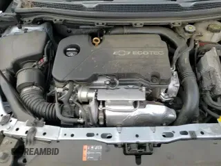 2017 Chevrolet Cruze LS z VIN 1G1BC5SM6H7177354, wystawiony jako Copart lot #82750035 z przebiegiem 100 598 mil mil oraz Szkoda całkowita • Salvage title. Historia ofert i sprzedaży dostępna na DreamBid. Obrazek 14.