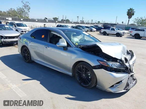 ✅ 2022 Toyota Camry TRD • VIN: 4T1KZ1AK4NU064509 • Lot: 44603000. Listed on IAAI with 29,232 mi. Free auction sales archive from the USA and detailed vehicle history report at DreamBid. Image 1.