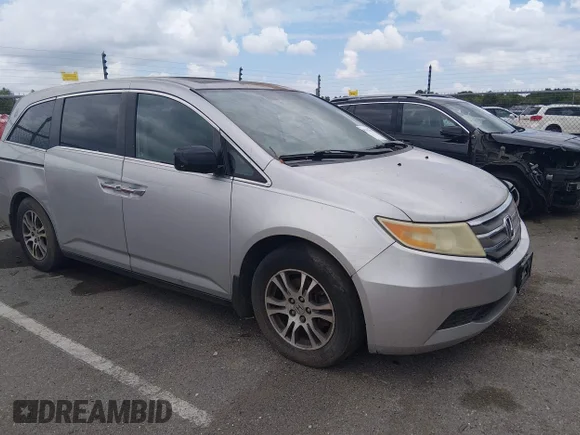 ✅ 2011 Honda Odyssey EX-L • VIN: 5FNRL5H61BB021884 • Lot: 45457032. Wystawiony na IAAI z przebiegiem 198 668 mil. Bezpłatny archiwum sprzedaży aukcyjnych z USA i szczegółowy raport historii pojazdu na DreamBid. Zdjęcie 1.