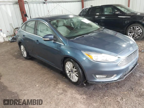 ✅ 2018 Ford Focus Titanium • VIN: 1FADP3J26JL294203 • Lot: 45018116. Wystawiony na IAAI z przebiegiem 80 895 mil. Bezpłatny archiwum sprzedaży aukcyjnych z USA i szczegółowy raport historii pojazdu na DreamBid. Zdjęcie 1.
