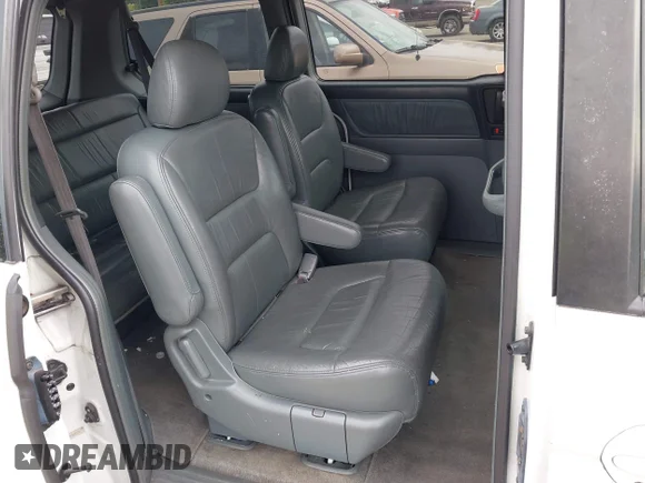 ✅ 2002 Honda Odyssey EX-L • VIN: 5FNRL18962B051739 • Лот: 45253919. Опубліковано раніше на IAAI з пробігом 170 063 миль. Безкоштовний доступ до архіву аукціонних продажів зі США та докладний звіт про історію автомобіля на DreamBid. Зображення 8.
