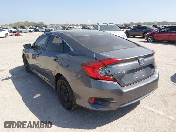 ✅ 2018 Honda Civic LX • VIN: 19XFC2F58JE029173 • Lot: 44697006. Wystawiony na IAAI z przebiegiem 132 926 mil. Bezpłatny archiwum sprzedaży aukcyjnych z USA i szczegółowy raport historii pojazdu na DreamBid. Zdjęcie 3.