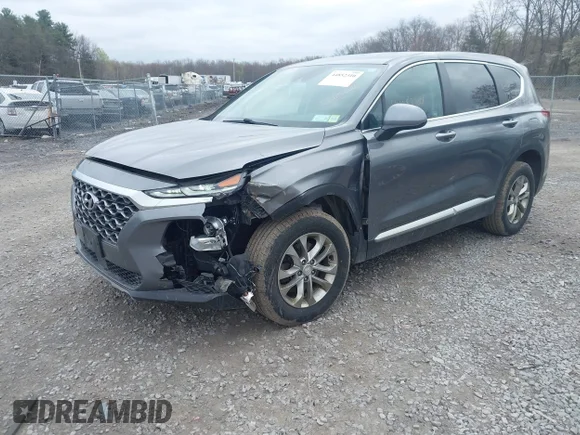 ✅ 2019 Hyundai Santa Fe SE • VIN: 5NMS2CAD2KH051458 • Lot: 44852310. Listed on IAAI with 88,827 mi. Free auction sales archive from the USA and detailed vehicle history report at DreamBid. Image 2.