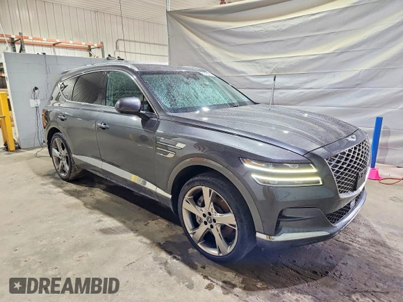 ✅ 2023 Genesis GV80 • VIN: KMUHCESC6PU126409 • Лот: 45482486. Опубликован ранее на Copart с пробегом 56 701 миль. Бесплатный доступ к архиву аукционных продаж из США и подробный отчёт об истории автомобиля на DreamBid. Изображение 4.