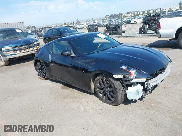 ✅ 2018 Nissan 370Z Touring • VIN: JN1AZ4EH0JM571985 • Lot: 43123590. Wystawiony na IAAI z przebiegiem 69 257 mil. Bezpłatny archiwum sprzedaży aukcyjnych z USA i szczegółowy raport historii pojazdu na DreamBid. Zdjęcie 1.
