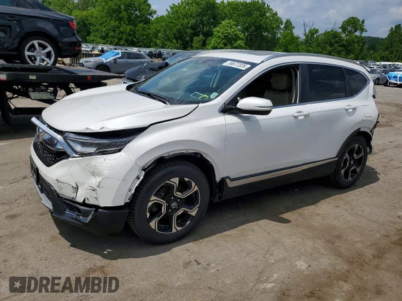 ✅ 2019 Honda CR-V Touring • VIN: 2HKRW2H91KH648151 • Lot: 56672326. Listed on Copart with 92,185 mi. Free auction sales archive from the USA and detailed vehicle history report at DreamBid. Image 1.