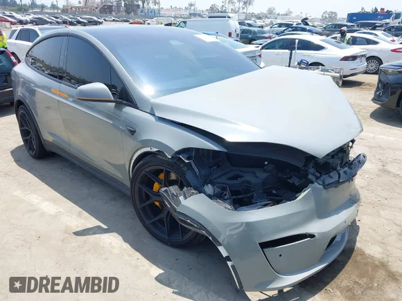 ✅ 2022 Tesla Model X Plaid • VIN: 7SAXCBE60NF351677 • Лот: 42449123. Опубликован ранее на IAAI с пробегом Не указан. Бесплатный доступ к архиву аукционных продаж из США и подробный отчёт об истории автомобиля на DreamBid. Изображение 1.