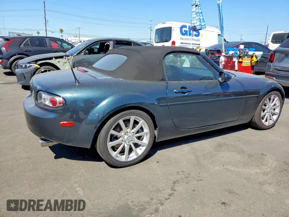 ✅ 2006 Mazda MX-5 Miata Touring • VIN: JM1NC25F060105801 • Lot: 55079536. Wystawiony na Copart z przebiegiem 91 312 mil. Bezpłatny archiwum sprzedaży aukcyjnych z USA i szczegółowy raport historii pojazdu na DreamBid. Zdjęcie 3.