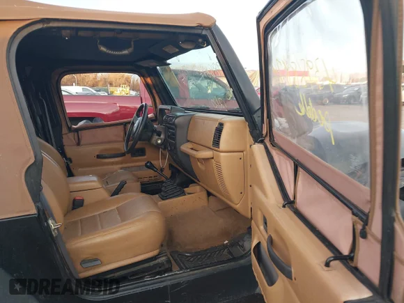 ✅ 1998 Jeep Wrangler SE • VIN: 1J4FY29P2WP709554 • Lot: 43988874. Wystawiony na IAAI z przebiegiem 185 198 mil. Bezpłatny archiwum sprzedaży aukcyjnych z USA i szczegółowy raport historii pojazdu na DreamBid. Zdjęcie 5.