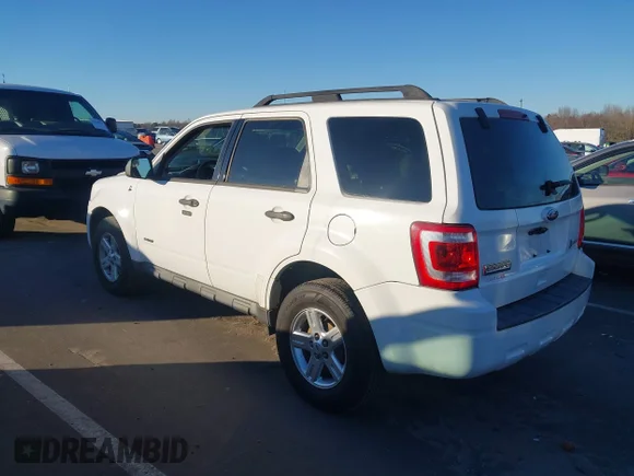 ✅ 2011 Ford Escape Hybrid Limited • VIN: 1FMCU5K35BKA57433 • Лот: 43941581. Опубліковано раніше на IAAI з пробігом 151 618 миль. Безкоштовний доступ до архіву аукціонних продажів зі США та докладний звіт про історію автомобіля на DreamBid. Зображення 3.