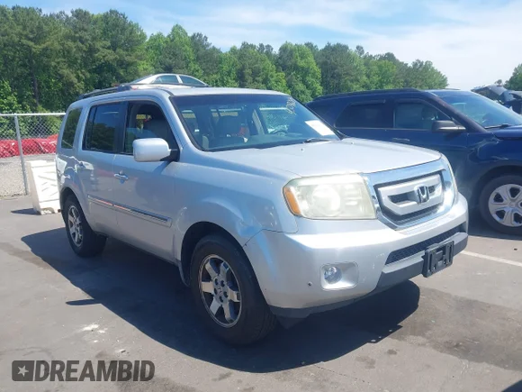✅ 2009 Honda Pilot Touring • VIN: 5FNYF48839B027677 • Lot: 45096075. Wystawiony na IAAI z przebiegiem 243 041 mil. Bezpłatny archiwum sprzedaży aukcyjnych z USA i szczegółowy raport historii pojazdu na DreamBid. Zdjęcie 1.