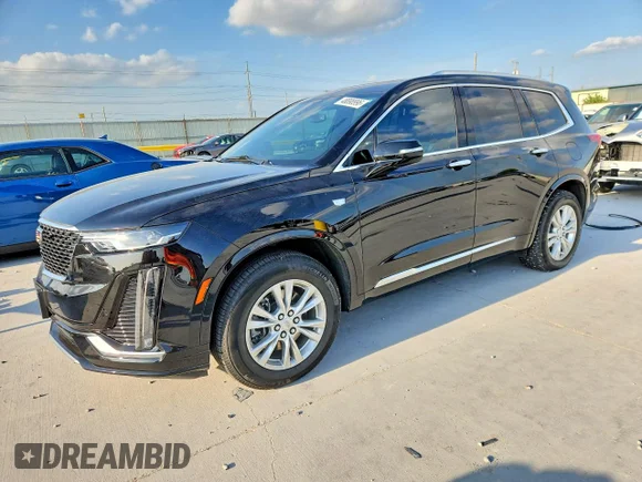 ✅ 2024 Cadillac XT6 FWD Luxury • VIN: 1GYKPAR42RZ718880 • Lot: 48898996. Listed on Copart with 51,972 mi. Free auction sales archive from the USA and detailed vehicle history report at DreamBid. Image 1.