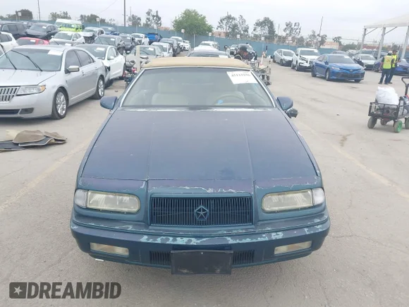 ✅ 1995 Chrysler LeBaron GTC • VIN: 1C3EU4531SF519857 • Лот: 45115256. Опубліковано раніше на IAAI з пробігом 139 754 миль. Безкоштовний доступ до архіву аукціонних продажів зі США та докладний звіт про історію автомобіля на DreamBid. Зображення 6.