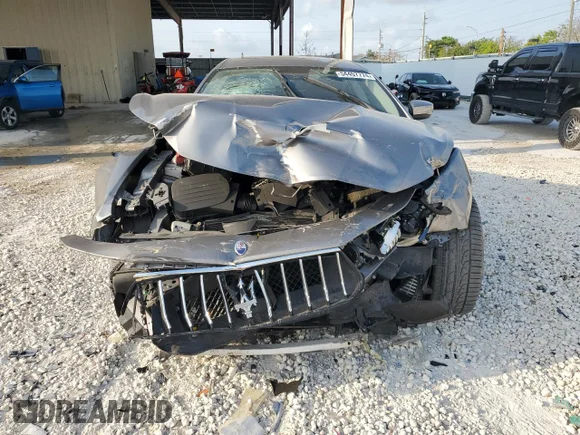 ✅ 2018 Maserati Ghibli • VIN: ZAM57XSA6J1275847 • Лот: 72444404. Опубліковано раніше на Copart з пробігом 82 612 миль. Безкоштовний доступ до архіву аукціонних продажів зі США та докладний звіт про історію автомобіля на DreamBid. Зображення 5.