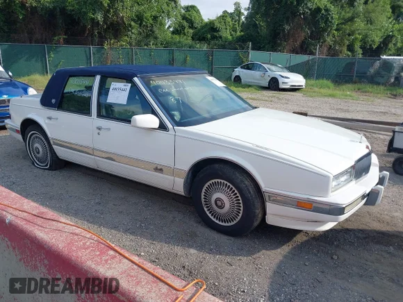 ✅ 1991 Cadillac Seville • VIN: 1G6KS53B9MU820155 • Lot: 40035441. Wystawiony na IAAI z przebiegiem 78 021 mil. Bezpłatny archiwum sprzedaży aukcyjnych z USA i szczegółowy raport historii pojazdu na DreamBid. Zdjęcie 1.