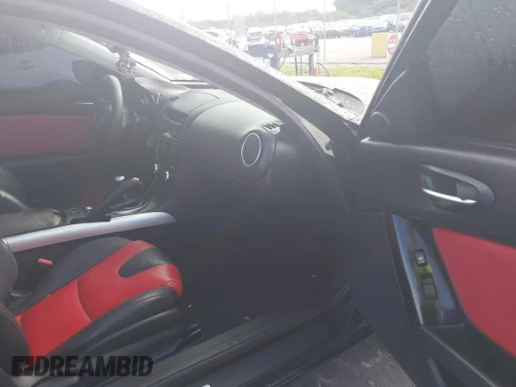 ✅ 2005 Mazda RX-8 • VIN: JM1FE173650142037 • Lot: 42926729. Wystawiony na IAAI z przebiegiem 162 066 mil. Bezpłatny archiwum sprzedaży aukcyjnych z USA i szczegółowy raport historii pojazdu na DreamBid. Zdjęcie 5.