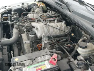 ✅ 2004 Kia Sorento LX • VIN: KNDJD733345321594 • Lot: 43637749. Wystawiony na IAAI z przebiegiem 212 581 mil. Bezpłatny archiwum sprzedaży aukcyjnych z USA i szczegółowy raport historii pojazdu na DreamBid. Zdjęcie 12.