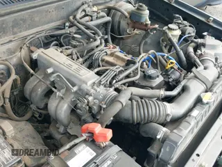 ✅ 1990 Toyota Pickup DX • VIN: JT4RN81P1L5083917 • Лот: 43185786. Опубликован ранее на IAAI с пробегом 190 343 миль. Бесплатный доступ к архиву аукционных продаж из США и подробный отчёт об истории автомобиля на DreamBid. Изображение 16.