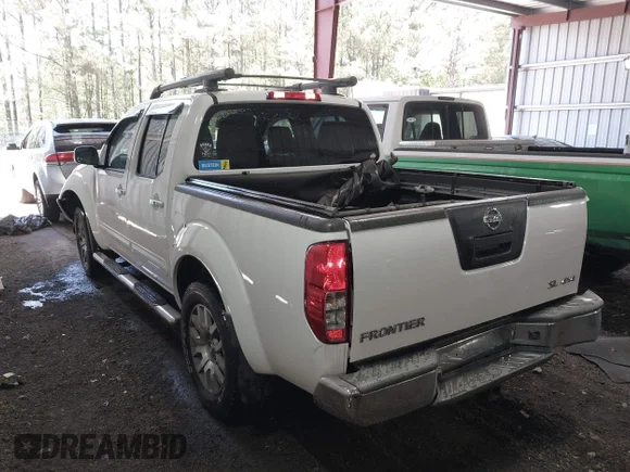 ✅ 2012 Nissan Frontier SV • VIN: 1N6AD0EV8CC400305 • Lot: 42048834. Listed on IAAI with 104,720 mi. Free auction sales archive from the USA and detailed vehicle history report at DreamBid. Image 3.