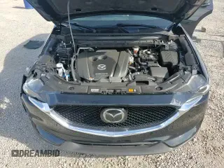 ✅ 2020 Mazda CX-5 Grand Touring • VIN: JM3KFBDM7L1838466 • Лот: 81743365. Опубликован ранее на Copart с пробегом 66 630 миль. Бесплатный доступ к архиву аукционных продаж из США и подробный отчёт об истории автомобиля на DreamBid. Изображение 16.