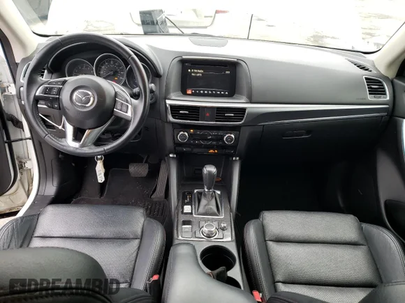 ✅ 2016 Mazda CX-5 Grand Touring • VIN: JM3KE4DY8G0852177 • Лот: 41925323. Опубліковано раніше на Copart з пробігом 73 023 миль. Безкоштовний доступ до архіву аукціонних продажів зі США та докладний звіт про історію автомобіля на DreamBid. Зображення 8.